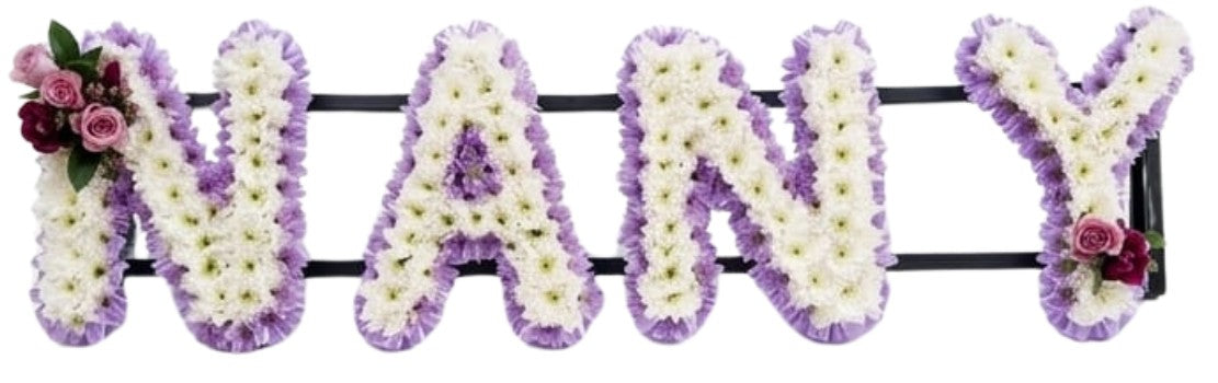 Purple and white funeral flower letter tribute